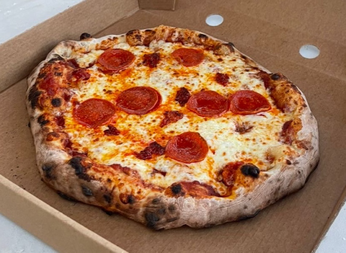 Wood fired pizza in box